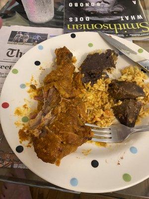 Recent take out meal- beef stew, stewed chicken, rice, black beans. (Got two meals, one chicken one beef). Look at that chicken leg!