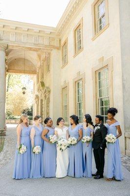 Floor-length bridesmaids dresses in periwinkle and lux chiffon by Bella Bridesmaids. Photo by Leigh Wolfe Photography.