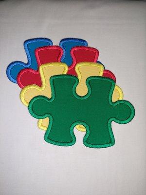 Iron on embroidery puzzle pieces.  Monogram available.