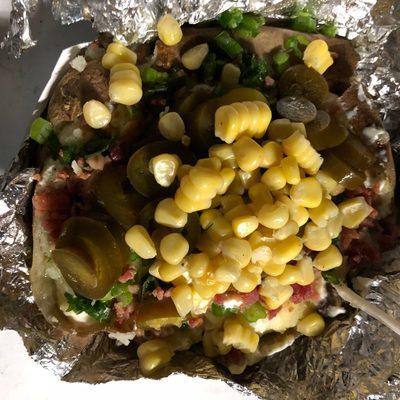 Loaded baked potatoe with corn