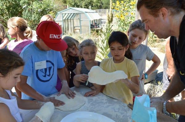 Making pizza during Farm-to-Table camp with Chef Scott from Bistro Don Giovanni