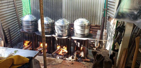 Wood burning steam rice cookers