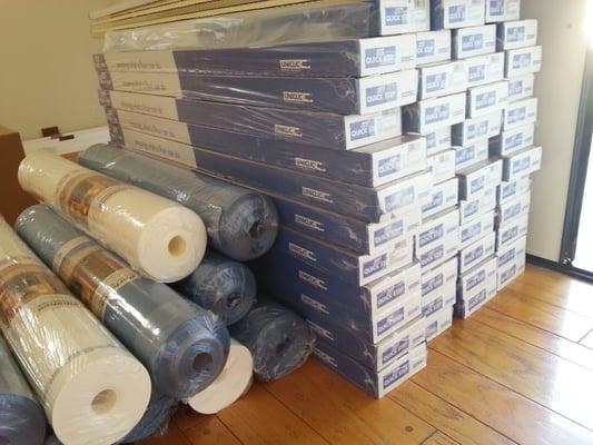 Some of the 72 boxes of flooring we purchased