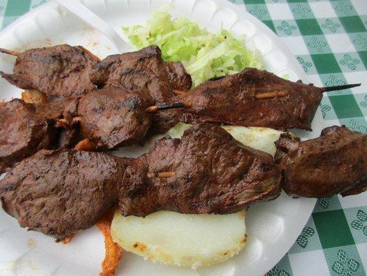 Anticuchos - Calf heart marinated, skewered, and seared over the grill