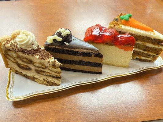 Delicious cheesecake, carrot cake. Chocolate mousse and tiramisu