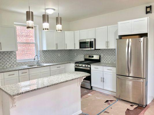 This was a Full Gut Renovation project on a 2 Family Home. We installed New cabinets , Appliances & Granite Counters for New Owners.