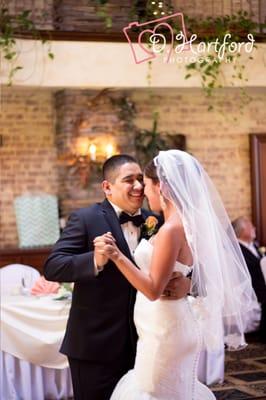 Bride and Groom share first dance as married couple. Wedding Photography